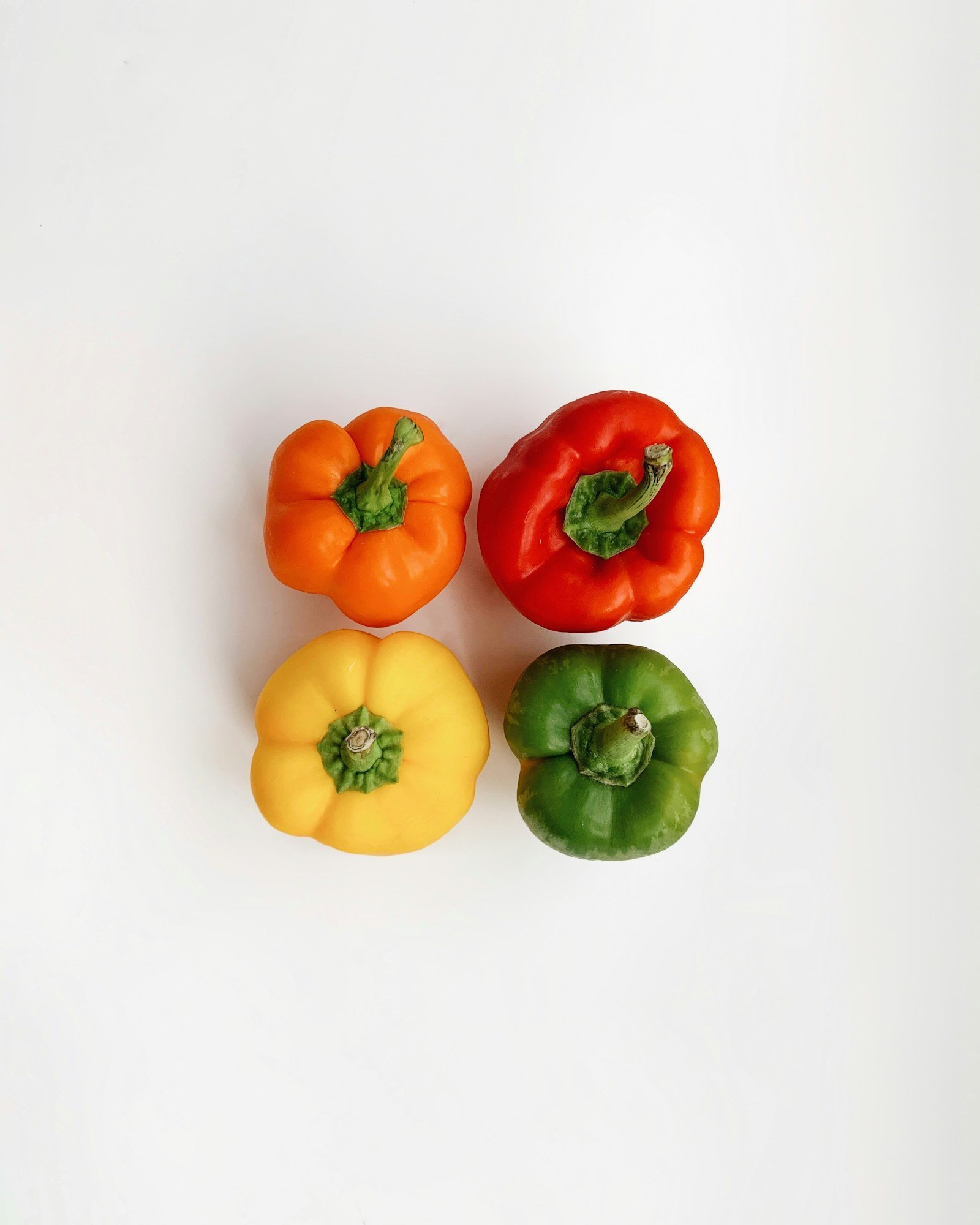 Fresh red and yellow peppers ready for harvest